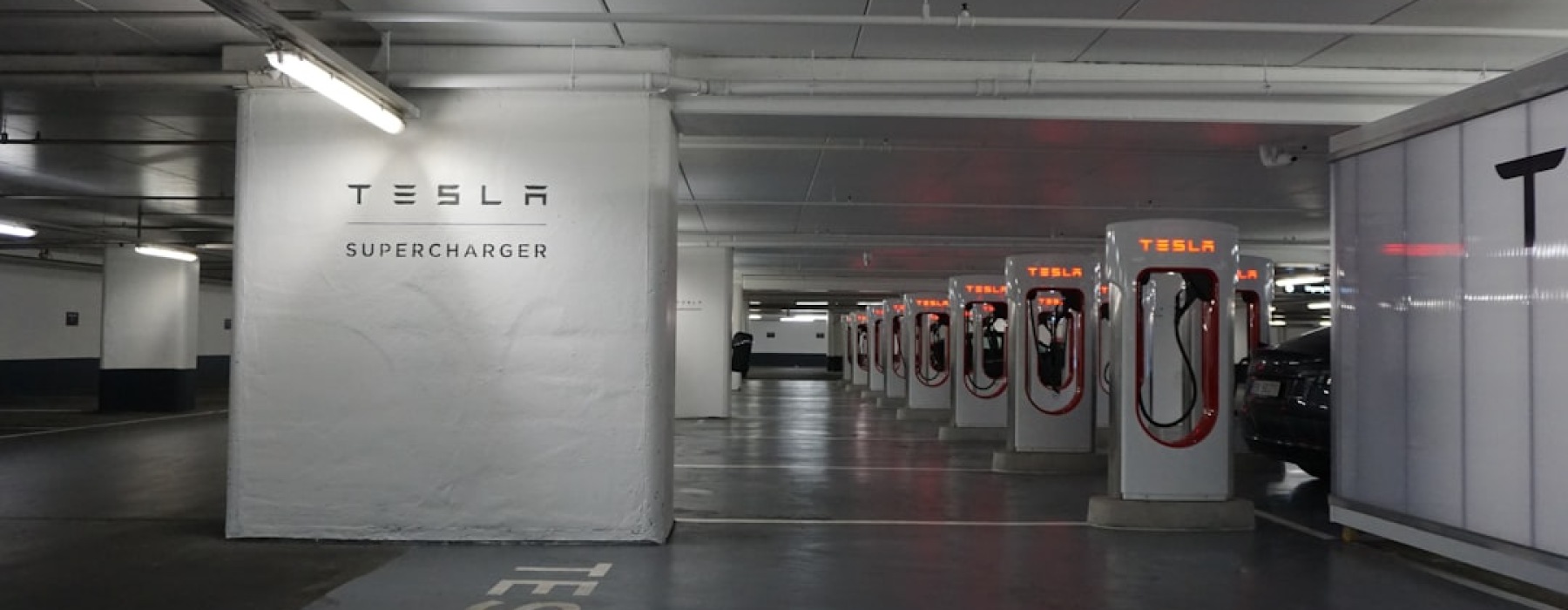Apartments with Tesla charger at a modern apartment complex - Apartments with Tesla charger