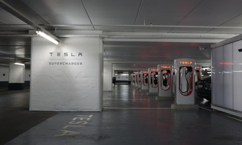 Apartments with Tesla charger at a modern apartment complex - Apartments with Tesla charger
