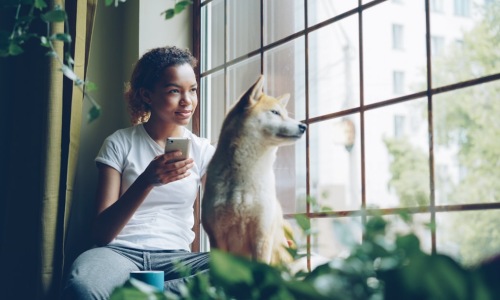person searching apartments with dog